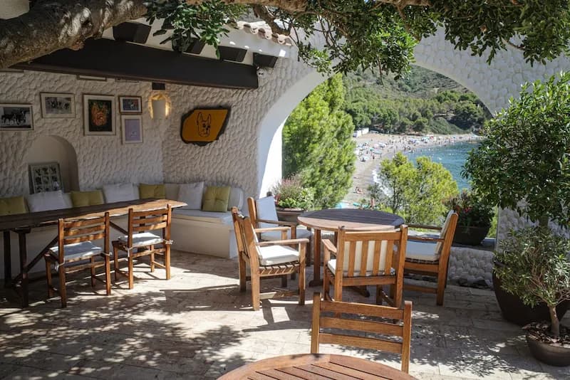 Tables on the terrace at El Bulli restaurant, Cala Montjoi, Costa Brava in Spain. El Bulli was a Michelin 3-star restaurant run by chef Ferran Adrià.