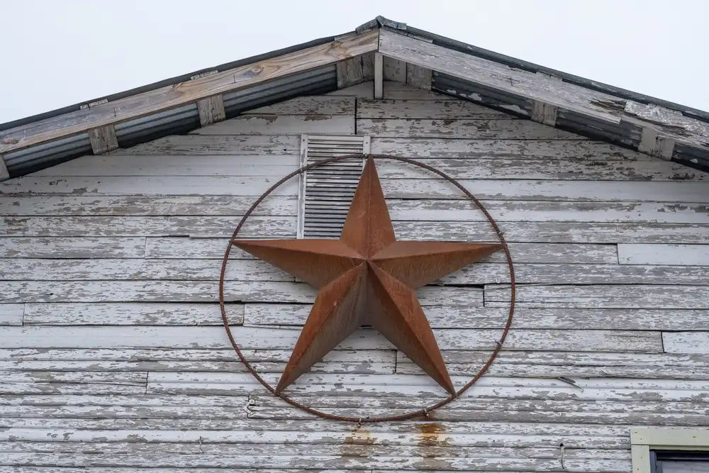 Weather in Austin, TX can affect your food truck business - image of the red Texas star on a wooden building