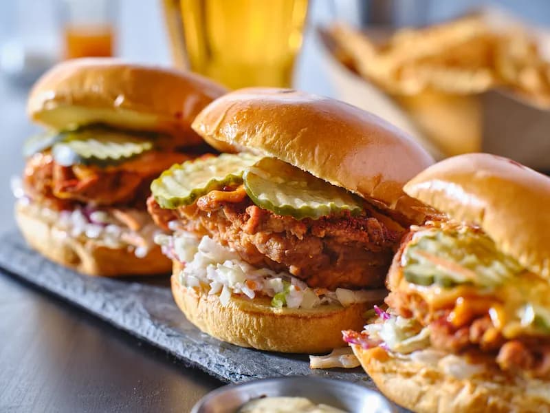 Nashville hot chicken sandwiches being served from a food truck in Nashville, Tennessee. When starting a food truck business in Nashville, you need to know where to park to maximize sales.
