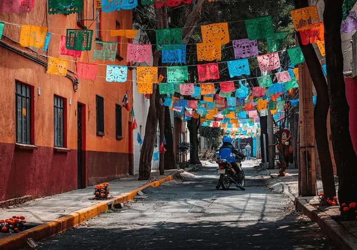 A rustic street in Mexico City, Mexico, that is ready to honor its Dia de los Muertos celebrations. Mexico is home to some of the best culinary schools in the world.