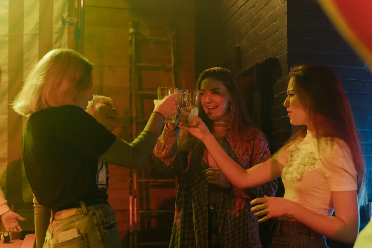 Younger customers are more likely to try new drinks, so it's important to track the sales of your mixology drinks and be ready to change. As shown in this image of a group of female friends enjoying cocktails at a bar.