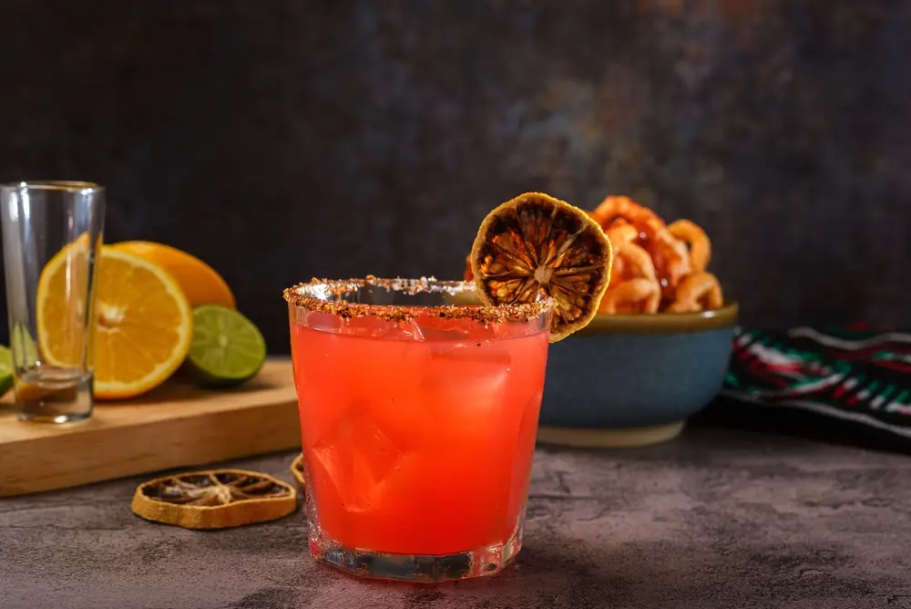 An ultimate mixologist can bring in more guests and increase sales by offering unique drinks that your competitors probably don't. As shown in this image of a mixologist's take on a classic cocktail with fresh herbs and fruits.