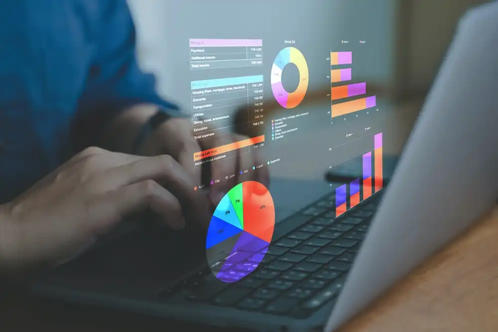 Food delivery apps like DoorDash, Uber Eats, and Grubhub provide various levels of support to restaurants through phone, live chat, and email. Image of a restaurant owner viewing a data dashboard.
