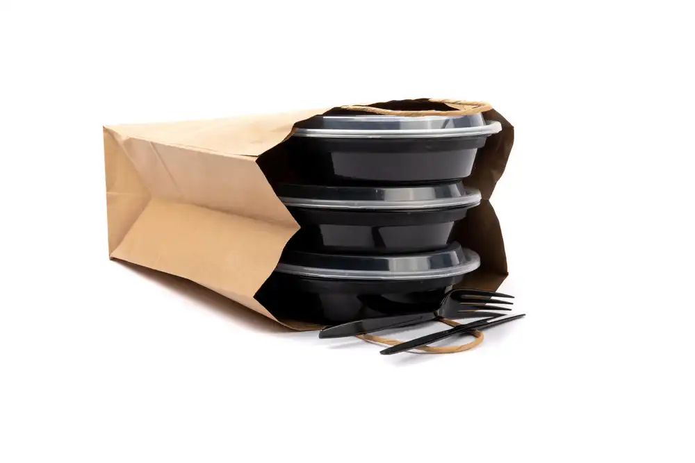 Food delivery apps in Latin America are a growing market. Image of packaging and paper bag used in food delivery.