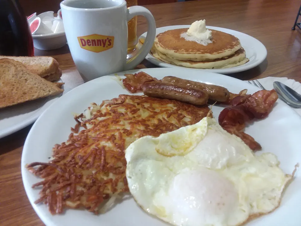 Denny's flagship menu item: the Grand Slam breakfast. The Grand Slam breakfast has been a staple of Denny's Diner since its introduction in 1977.
