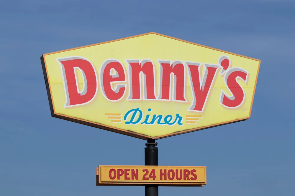 The Denny's Diner sign outside one of their 1600+ locations. Denny's Diner continues to be highly successful since its founding.