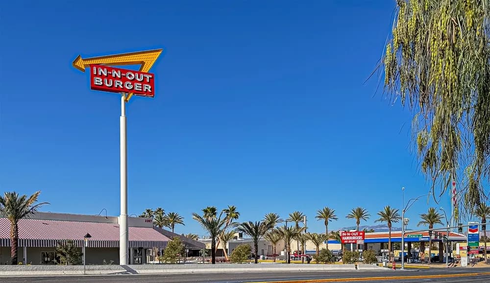 A tall highway sign for an In-N-Out Burger location in Las Vegas, Nevada. All In N Out locations are company owned.